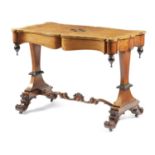 AN EARLY VICTORIAN SATINWOOD LIBRARY TABLE C.1840 the serpentine top with burr veneers and
