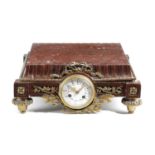 A FRENCH ROUGE GRIOTTE MARBLE AND GILT BRONZE PLINTH TIMEPIECE LATE 19TH CENTURY of square form, the