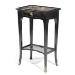 A CONTINENTAL EBONISED OCCASIONAL TABLE EARLY 19TH CENTURY the rectangular top inset with red marble