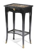 A CONTINENTAL EBONISED OCCASIONAL TABLE EARLY 19TH CENTURY the rectangular top inset with red marble