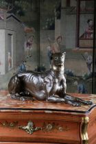 A LARGE FRENCH BRONZE MODEL OF A RECUMBENT GREYHOUND OR WHIPPET LATE 19TH / EARLY 20TH CENTURY