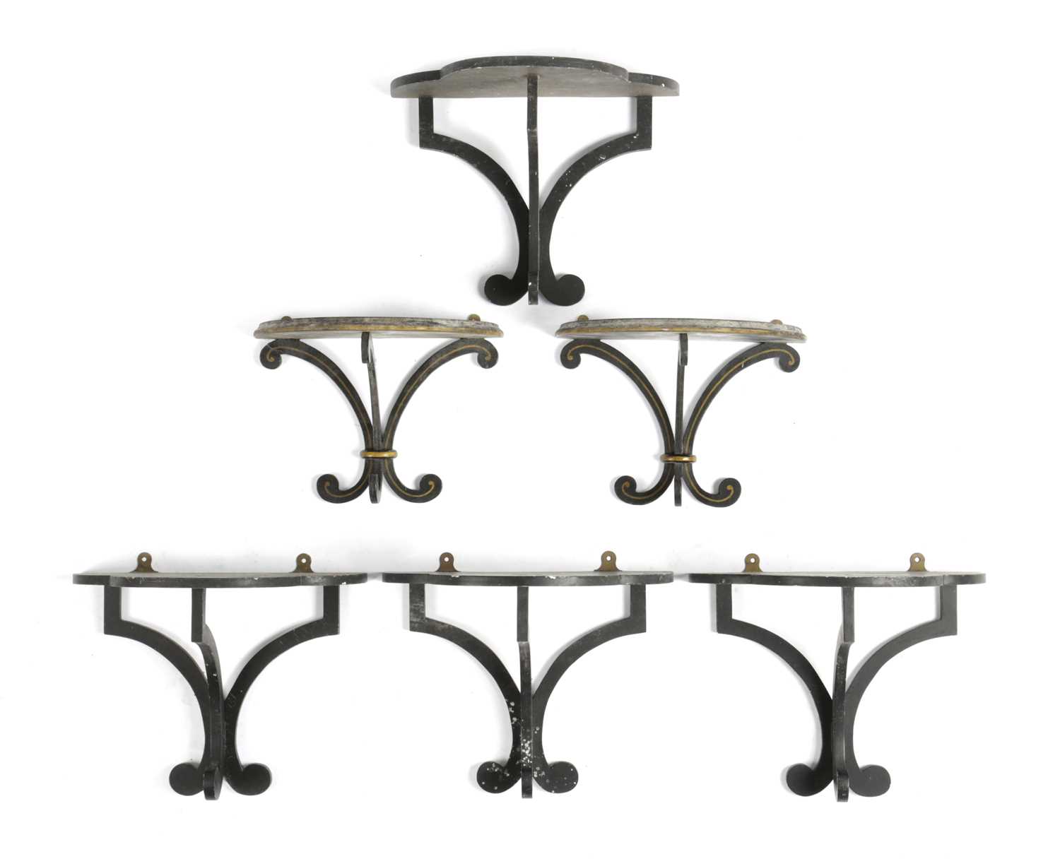 A SET OF FOUR EBONISED TREFOIL WALL BRACKETS BY COLEFAX & FOWLER, SECOND HALF 20TH CENTURY each with