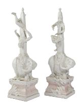 A PAIR OF ITALIAN POTTERY ELEPHANT AND ACROBAT OBELISKS AFTER GIAN LORENZO BERNINI, BY SANDINI,