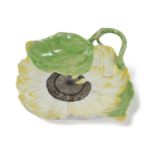 A CHELSEA PORCELAIN SUNFLOWER DISH OR STAND C.1755 modelled as a large open flower with two leaves