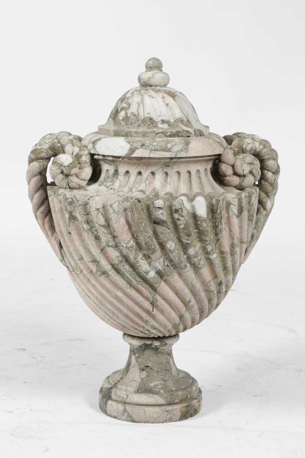 A FRENCH PINK AND GREY VEINED MARBLE URN 18TH CENTURY the wrythen domed cover above a pair of rope- - Image 9 of 10