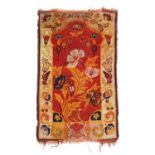 AN UNUSUAL ANATOLIAN PRAYER RUG EARLY 20TH CENTURY the blood red field with a large semi