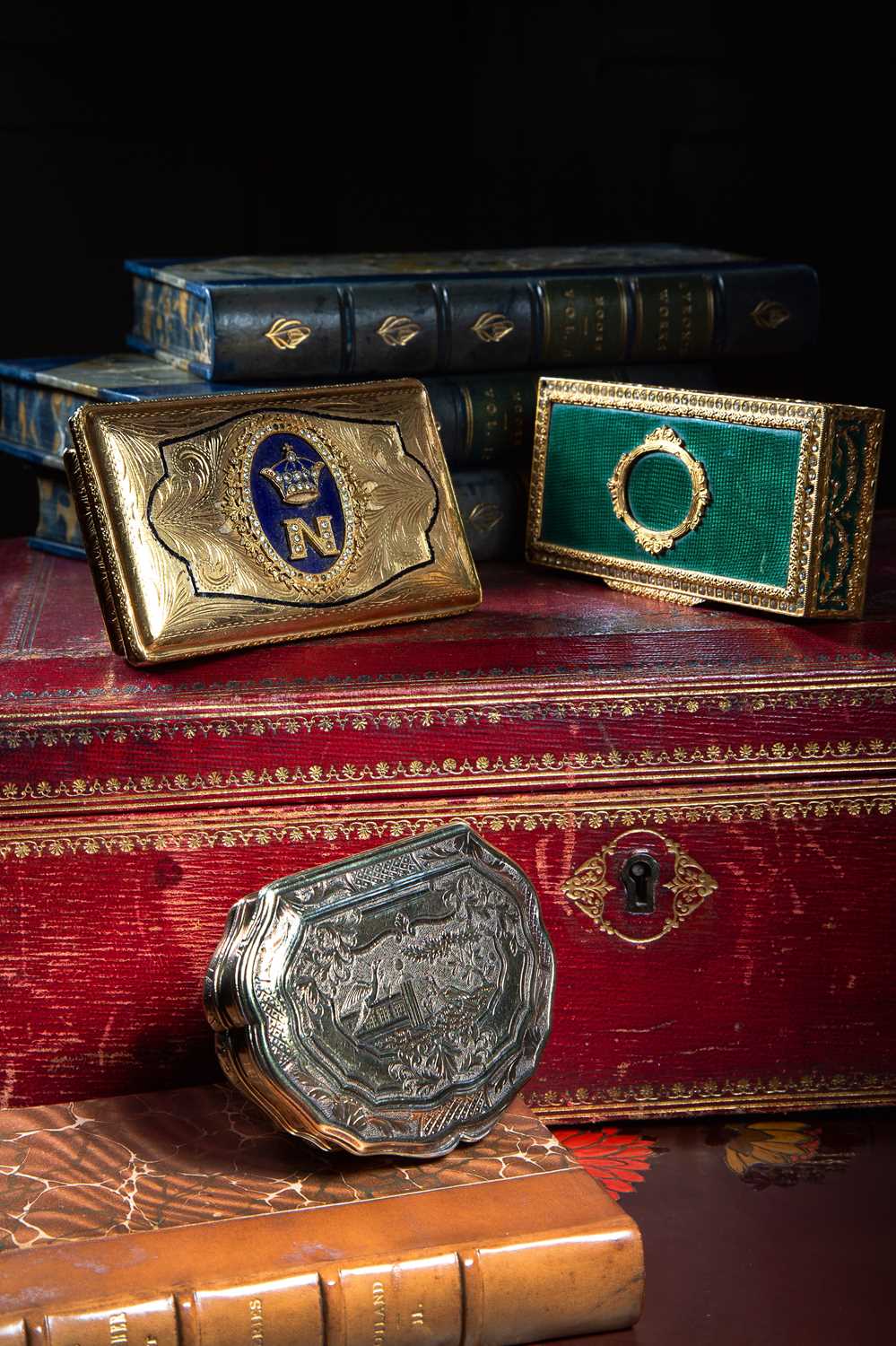 TWO GILT METAL SNUFF BOXES one with an oval panel of blue enamel applied with a coronet and the - Image 2 of 2