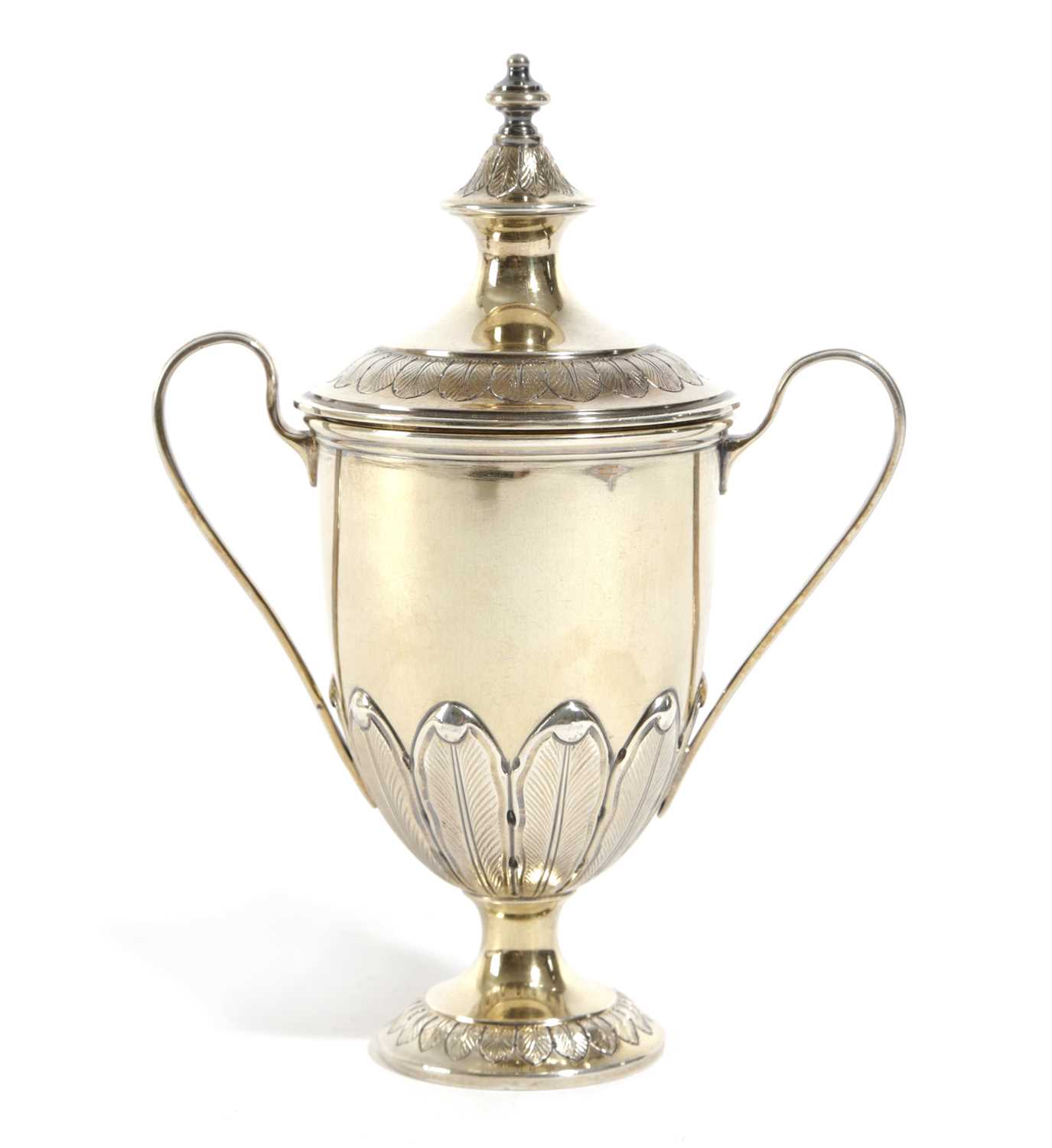 A SMALL SILVER-GILT CUP AND COVER BY D AND J WELLBY, LONDON, 1934 of vase form, with scroll