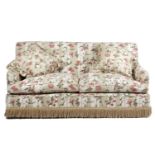 A MODERN TWO SEATER SOFA BY PORTMAN, 20TH CENTURY with chintz floral upholstery, on castors 82.5cm