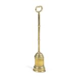 A BRASS DOORSTOP 19TH CENTURY of bell shape with a knopped stem and a pierced handle 55.3cm high