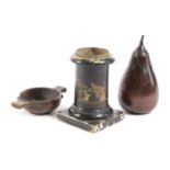 A TREEN FRUITWOOD TEA CADDY IN THE FORM OF AN AUBERGINE 20TH CENTURY with a screw-off calyx and