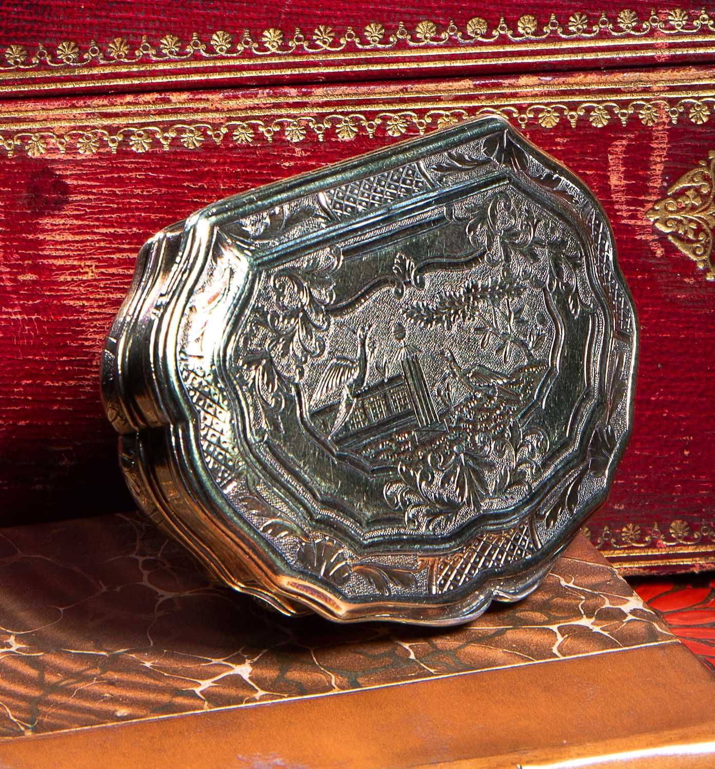 A SILVER- GILT SNUFF BOX, PROBABLY DUTCH OR FRENCH, MID-18TH CENTURY of cartouche shape, chased - Image 2 of 2