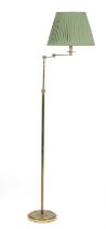 A MODERN BRASS READING STANDARD LAMP SECOND HALF 20TH CENTURY with an adjustable stem, an extendable