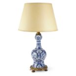 A DUTCH DELFT POTTERY BLUE AND WHITE VASE TABLE LAMP 18TH CENTURY AND LATER decorated with panels of