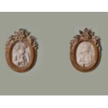 A RARE PAIR OF ITALIAN WHITE MARBLE RELIEF PORTRAITS OF AN OTTOMAN SULTAN AND HIS WIFE ATTRIBUTED TO