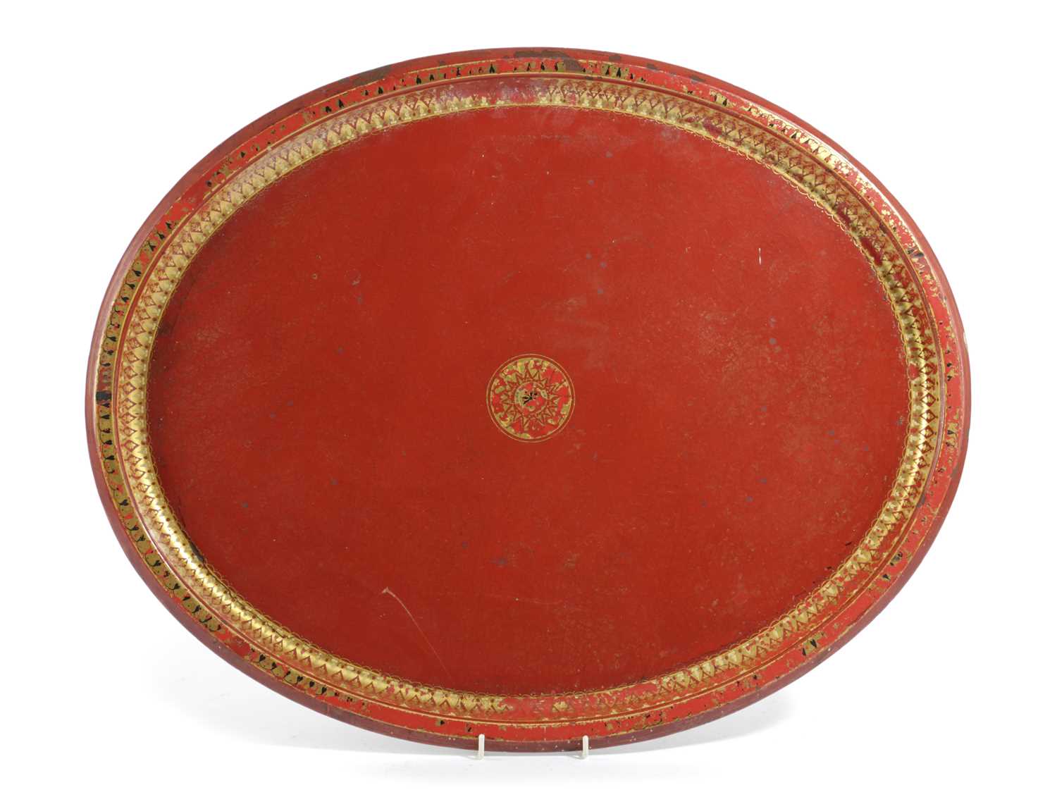 AN EARLY VICTORIAN RED TÔLE PEINTE OVAL TRAY with gilt decoration 48.5 x 61cm Provenance Parker &