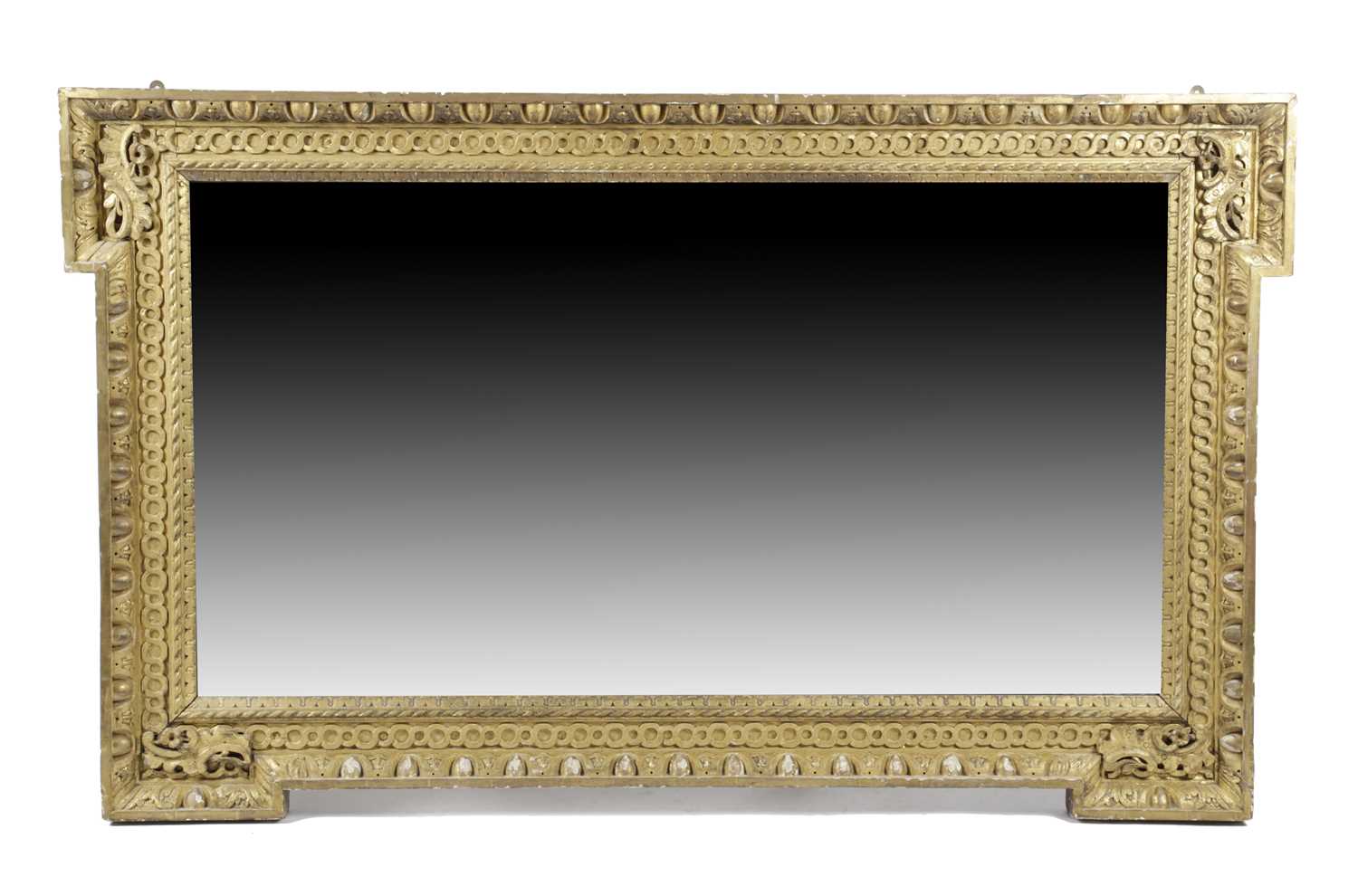 A GEORGE II GILTWOOD OVERMANTEL MIRROR IN THE MANNER OF WILLIAM KENT, C.1735 the rectangular plate