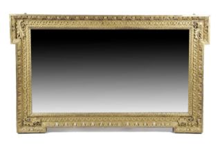 A GEORGE II GILTWOOD OVERMANTEL MIRROR IN THE MANNER OF WILLIAM KENT, C.1735 the rectangular plate