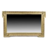 A GEORGE II GILTWOOD OVERMANTEL MIRROR IN THE MANNER OF WILLIAM KENT, C.1735 the rectangular plate