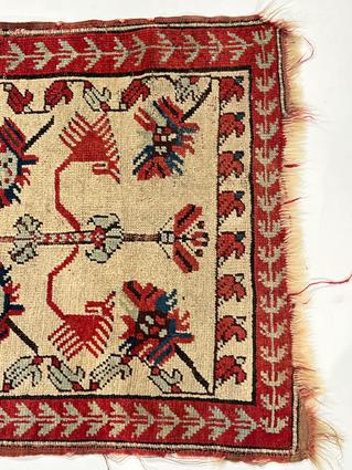 A MELAS RUG WEST ANATOLIA, C.1900 the cream field with a stylised tree of life enclosed by crimson - Image 4 of 4