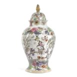 A LARGE STONE CHINA VASE AND COVER 19TH CENTURY printed and hand-coloured with chinoiserie scenes