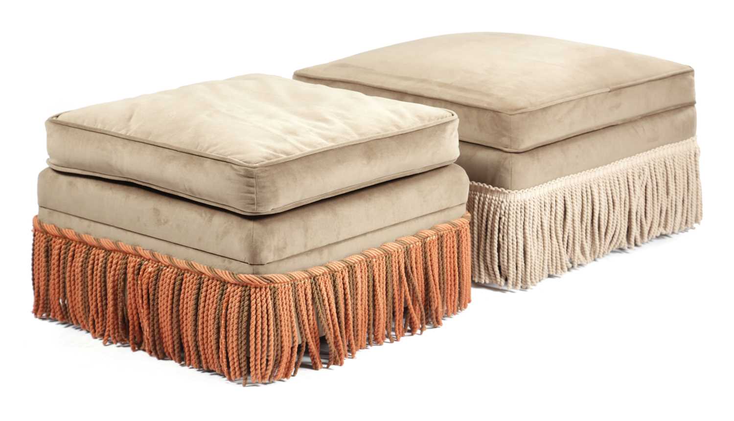 TWO OTTOMAN STOOLS LATE 20TH CENTURY each with tasselled fringes and on castors (2) 41.3cm high,