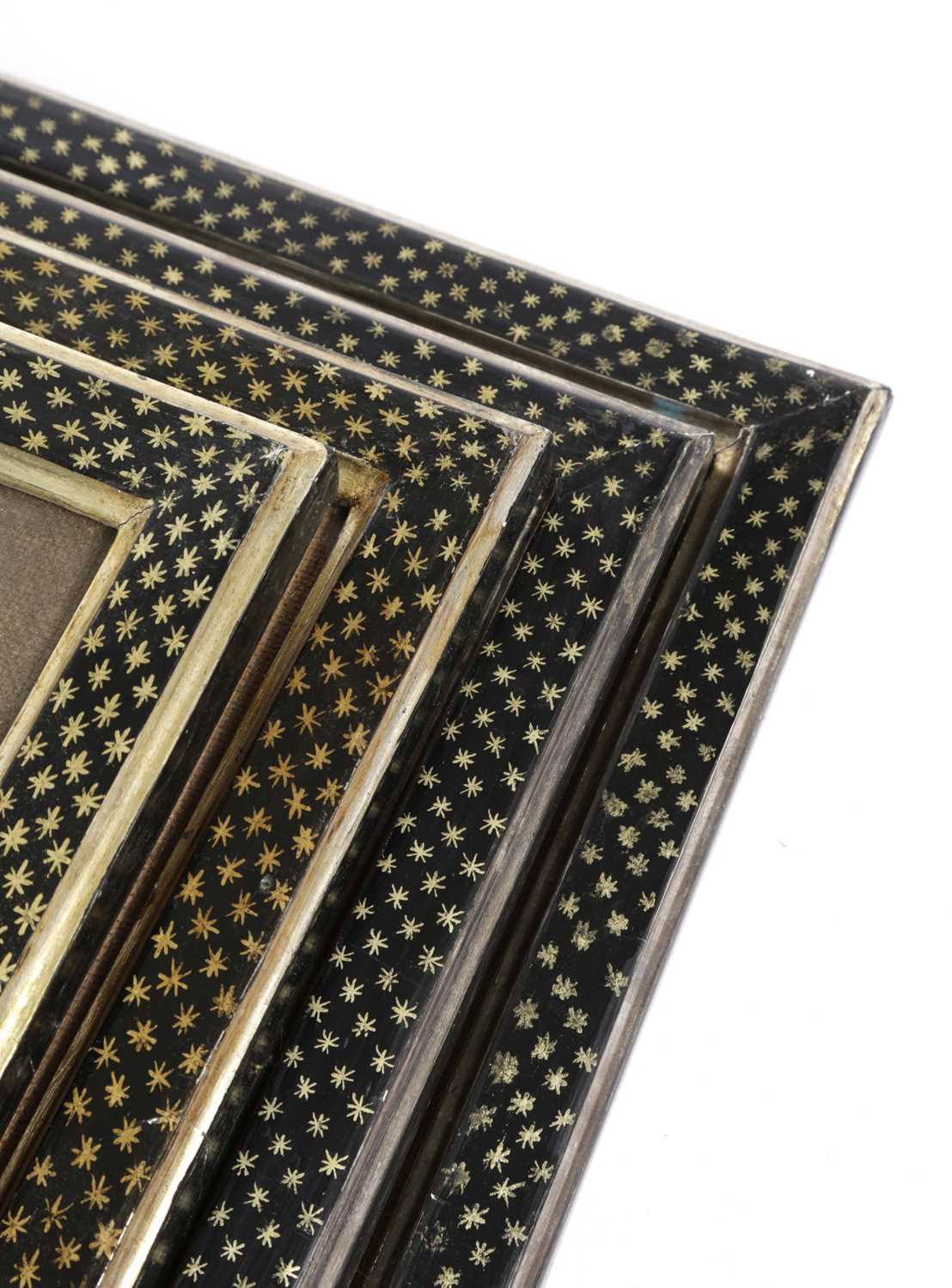 A SET OF FOUR PAINTED EBONISED AND GILT PICTURE FRAMES BY COLEFAX & FOWLER, IN REGENCY STYLE, C.
