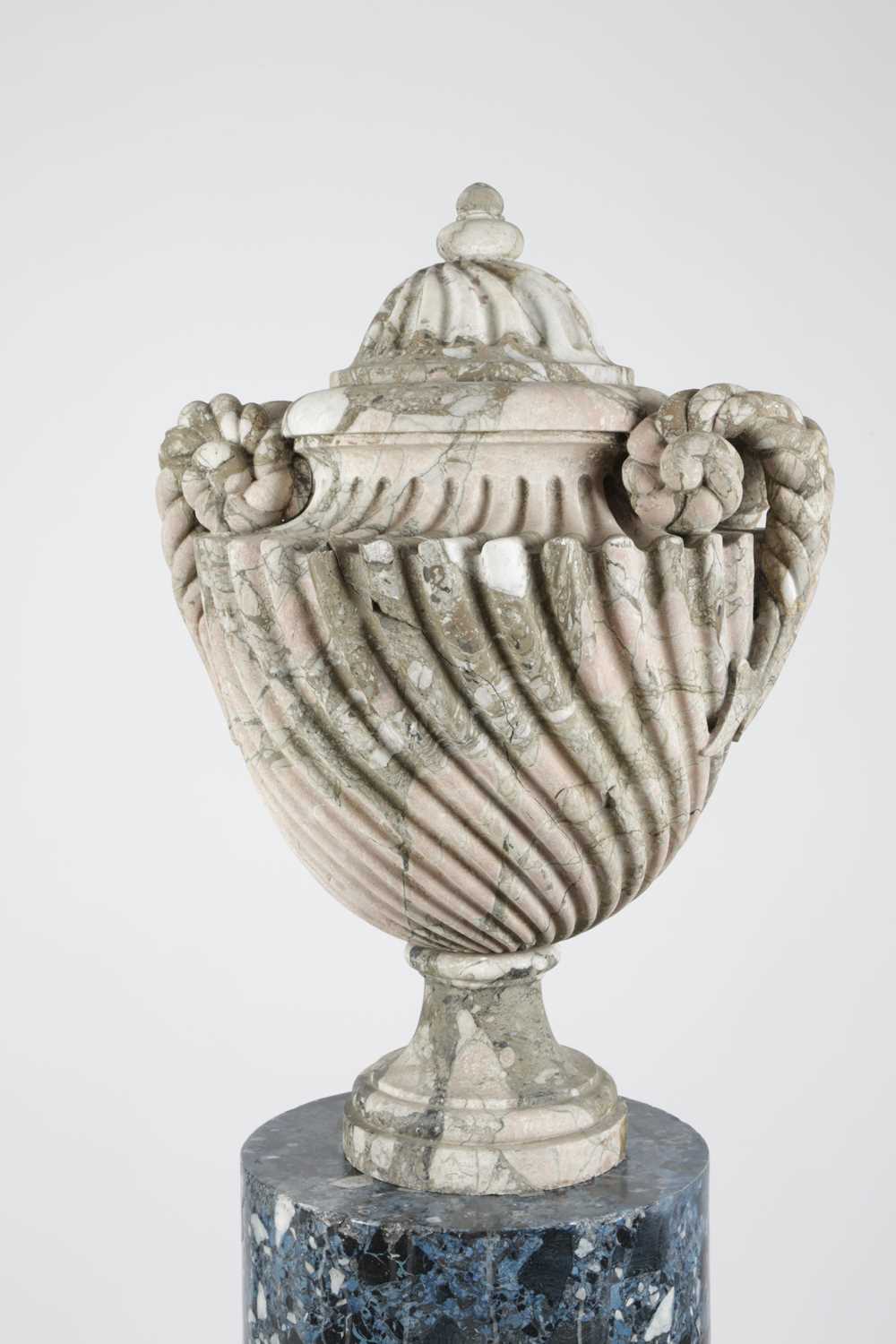 A FRENCH PINK AND GREY VEINED MARBLE URN 18TH CENTURY the wrythen domed cover above a pair of rope- - Image 6 of 10