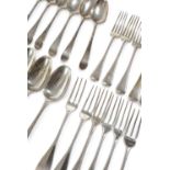 A COLLECTION OF SILVER FLATWARE comprising: six Scottish Hanoverian pattern three-pronged table