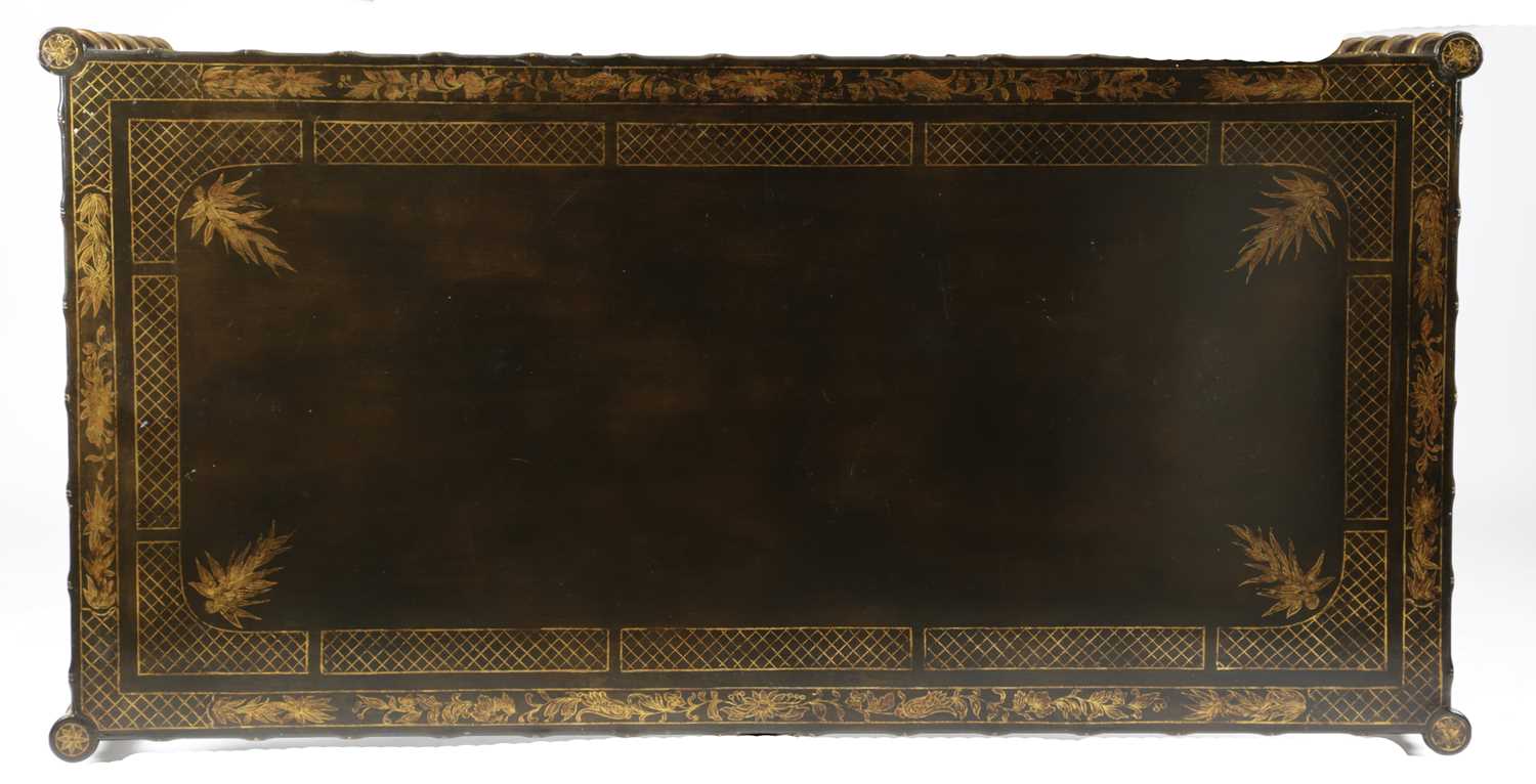 A BLACK JAPANNED WRITING TABLE IN REGENCY STYLE, AMERICAN, MID-20TH CENTURY with parcel gilt - Image 3 of 3