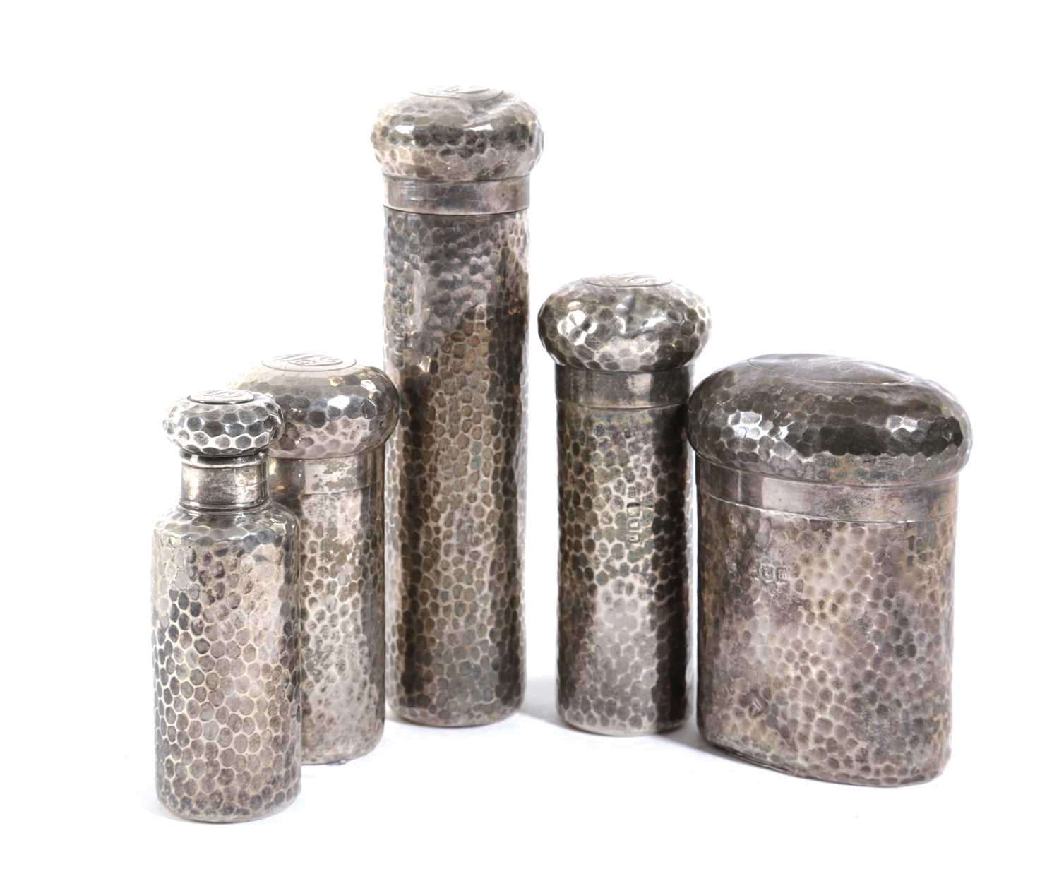 A SET OF FIVE LATE VICTORIAN SILVER TOILET JARS BY CHARLES DUMENIL, LONDON 1896 AND 1897 with spot