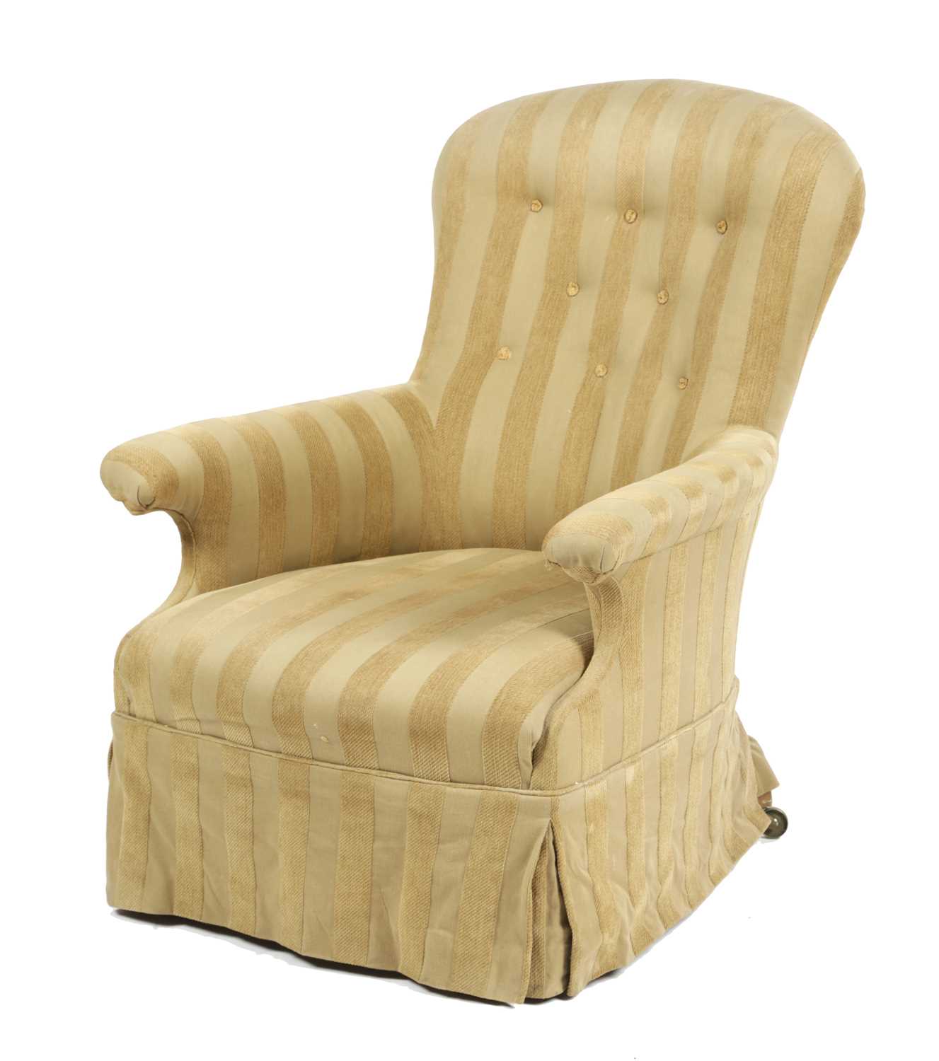 AN EARLY VICTORIAN WALNUT EASY ARMCHAIR C.1850-60 button upholstered with striped fabric on brass