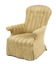 AN EARLY VICTORIAN WALNUT EASY ARMCHAIR C.1850-60 button upholstered with striped fabric on brass
