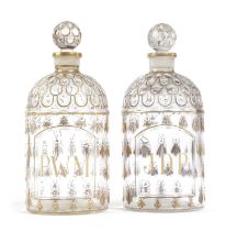 A PAIR OF FRENCH GLASS EAU DE COLOGNE BOTTLES AND STOPPERS BY GUERLAIN, 20TH CENTURY each
