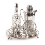 A COLLECTION OF SILVER PLATED WARES 20TH CENTURY to include: a cocktail shaker, ice crusher spoon,