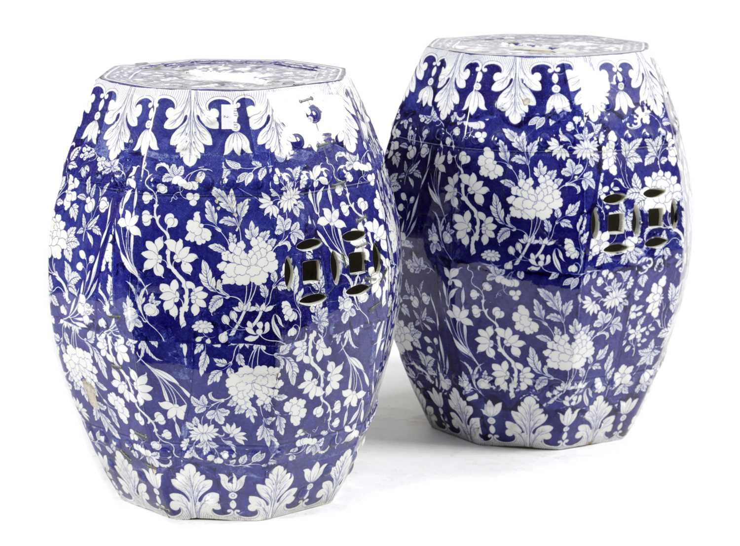 A PAIR OF ENGLISH POTTERY BLUE AND WHITE GARDEN SEATS IN CHINESE STYLE, 19TH CENTURY of octagonal
