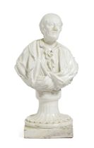 AN ÓRLEANS PORCELAIN BUST OF VOLTAIRE C.1770-80 modelled without his wig, draped in classical robes,