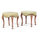 A PAIR OF ITALIAN RED PAINTED OVAL STOOLS IN ROCOCO FLORENTINE STYLE, 20TH CENTURY with parcel