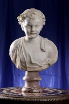 A ROMAN MARBLE HEAD OF A YOUNG BOY 1ST-2ND CENTURY A.D. AND LATER possibly a young Bacchus, with a