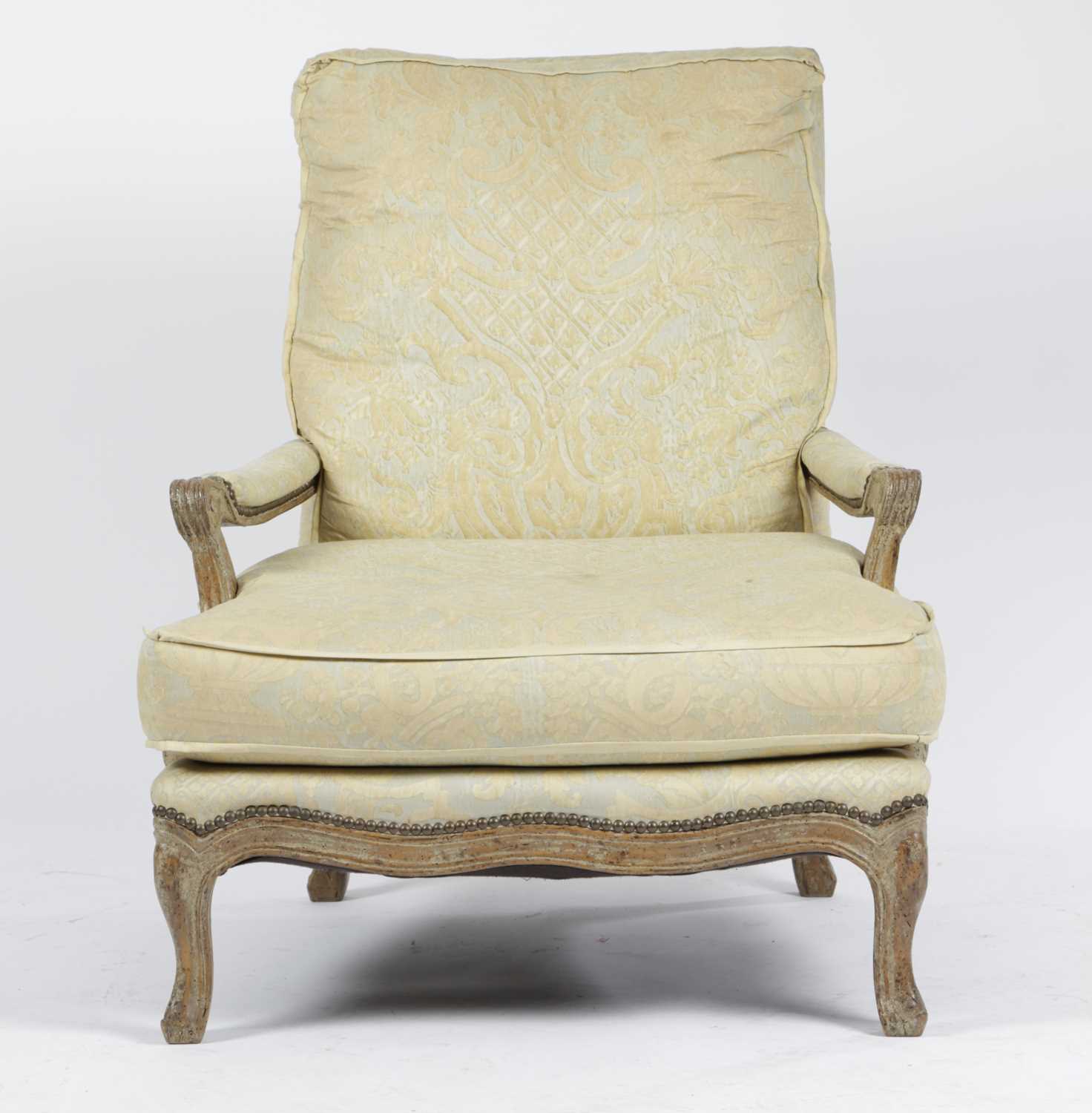 A FRENCH WALNUT BERGÈRE IN LOUIS XV STYLE, 19TH CENTURY upholstered with damask silk, with a moulded - Image 2 of 2