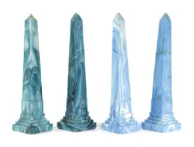 TWO PAIRS OF MARBLED GLASS OBELISKS 19TH CENTURY each with a stepped base (4) 28cm high (max)
