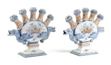 A PAIR OF DELFT POTTERY TULIPIÈRES 19TH CENTURY the flattened forms painted in red and blue with