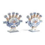 A PAIR OF DELFT POTTERY TULIPIÈRES 19TH CENTURY the flattened forms painted in red and blue with