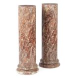 A PAIR OF ITALIAN FAUX MARBLE SCAGLIOLA COLUMNS 19TH CENTURY each of cylindrical form (2) 102.8cm