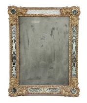 AN ITALIAN GILTWOOD WALL MIRROR VENETIAN, LATE 18TH / EARLY 19TH CENTURY the rectangular bevelled