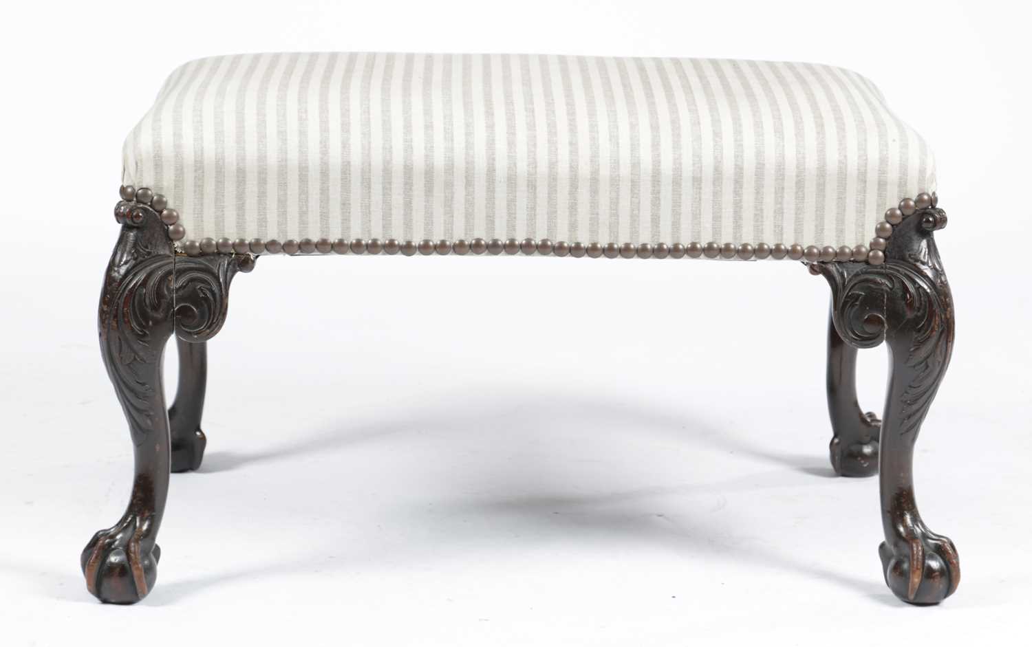 A MAHOGANY STOOL IN GEORGE II STYLE , LATE 19TH CENTURY the stuffed-over seat on leaf carved - Image 2 of 2