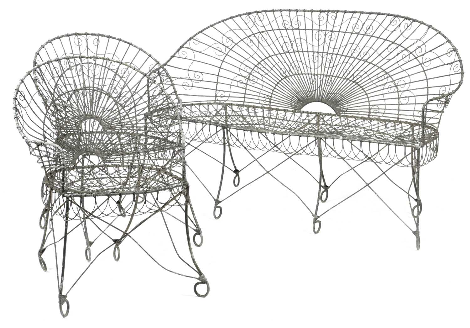 A WIREWORK GARDEN SEAT of fan shape, together with a pair of matching armchairs (3) 93.8cm high,