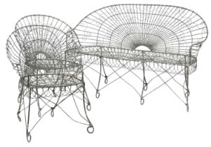 A WIREWORK GARDEN SEAT of fan shape, together with a pair of matching armchairs (3) 93.8cm high,