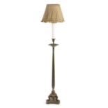 A PATINATED METAL STANDARD LAMP IN REGENCY STYLE, 19TH CENTURY converted from a candlestick with a