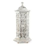 A FRENCH CAST IRON AND ENAMEL GARDEN STOVE LATE 19TH / EARLY 20TH CENTURY of hexagonal form with